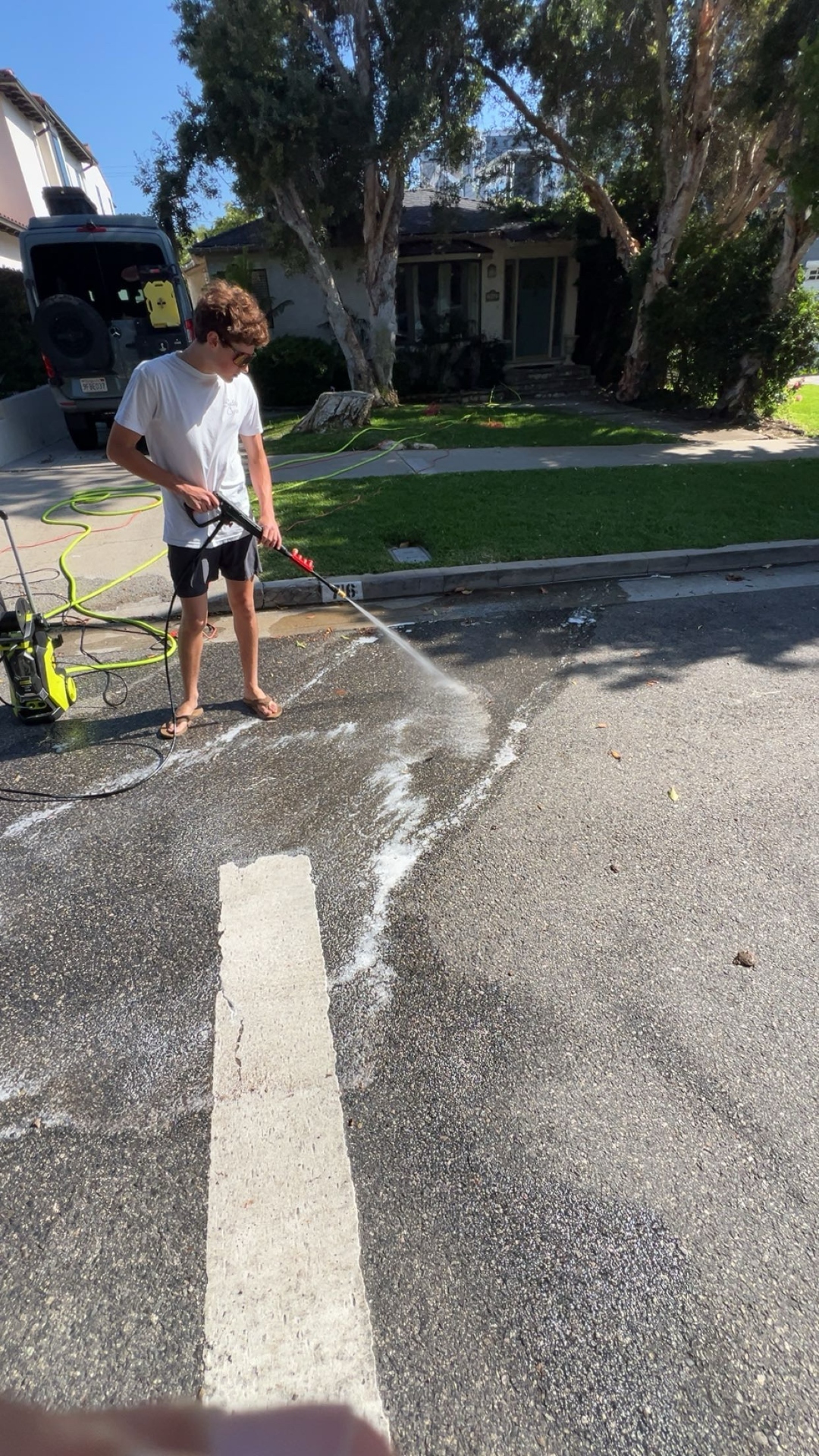 South Bay Sanitation team power washing a street in Redondo Beach
